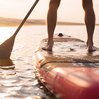 feet on paddleboard